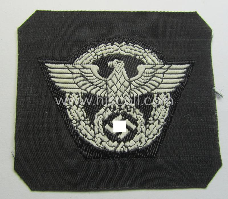 Attractive - and scarcely encountered! - EM- (ie. NCO-)pattern, Polizei- (ie. 'SS-Polizei') cap-eagle (ie. 'Adler für Schiffchen o. Einheitsfeldmütze') being a 'virtually mint- ie. unissued' example as executed in so-called: 'BeVo'-weave-style