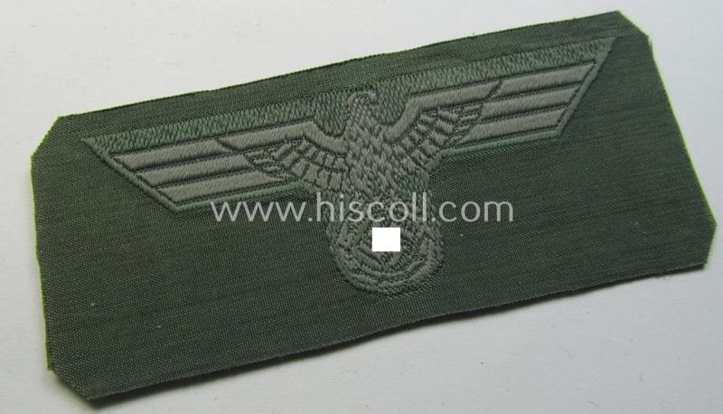WH (Heeres) early- (ie. mid-war-) period- and/or bluish-grey-coloured WH (Heeres) type side-cap-eagle as executed in the neat 'BeVo'-weave pattern onto a field-grey-coloured background