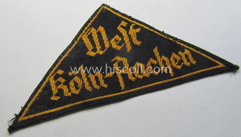 'HJ' ('Hitlerjugend') district-triangle (ie. 'Gebietsdreieck') entitled: 'West Köln-Aachen' being a just moderately used- and/or worn example that retains (most of) its period-attached 'RzM'-etiket