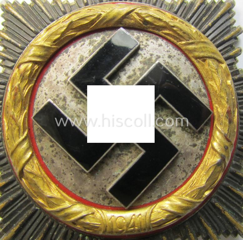 Superb, maker- (ie. '20'-marked-) example of WH (Heeres, Luftwaffe etc.) 'Deutsches Kreuz im Gold' (or DKiG ie. German Cross in gold) being a (regular- ie. 'light-weight') piece that was produced by the: 'C.F. Zimmermann'-company