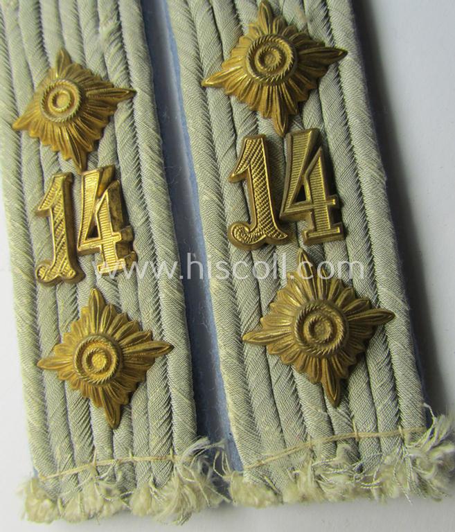 Attractive - and fully matching! - pair of WH (Heeres) neatly 'cyphered', officers'-type shoulderboards as piped in the bright-blue-coloured branchcolour as was intended for a: 'Hauptmann des Fahr-Abeilungs 14'