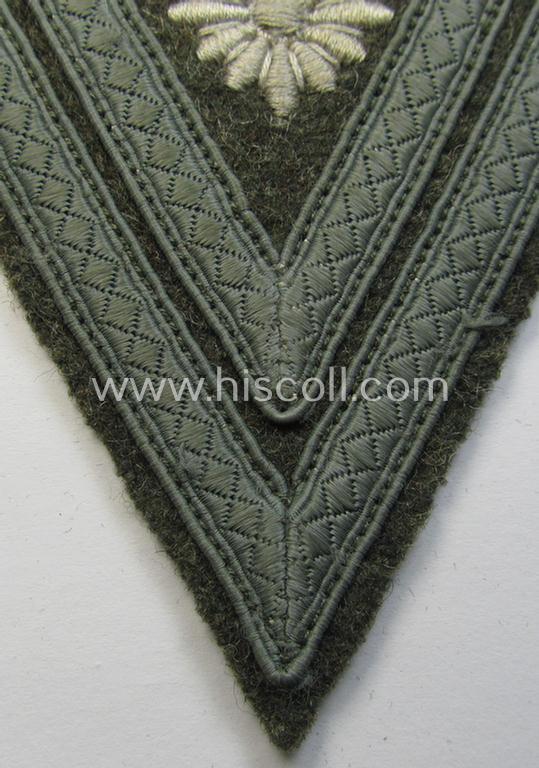 Attractive, WH (Heeres) 'Armwinkel' (or: arm-chevron) as executed on typical field-grey-coloured wool as was specifically intended for usage by a soldier with the (unusually encountered!) rank of: 'Stabsgefreiter'