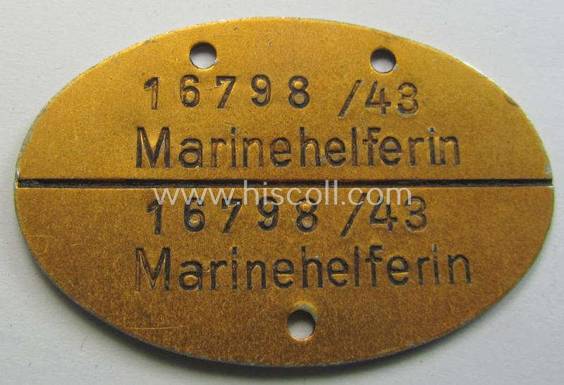 Female-related - and scarcely seen! - WH (Kriegsmarine) typical aluminium-based- and/or golden toned ID-disc (ie. 'Erkennungsmarke') bearing the engraved coded numeral (ie. text) that reads: 'Marinehelferin 16798/43'