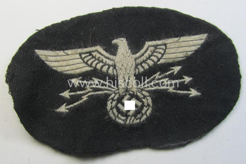 Superb - I deem 'variant'-pattern! - 'Postschutz'-arm-badge (ie. arm-eagle) being a piece as executed in the 'BeVo'-weave-pattern onto a black-coloured background and that comes in a moderately used- (ie. clearly tunic-removed-), condition