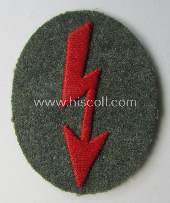 WH (Heeres) trade- and/or special-career-insignia ie. hand-embroidered 'signal-blitz' being a non-maker-marked example as executed in bright-red linnen as was specifically intended for a soldier serving within the: 'Artillerie-Truppen'