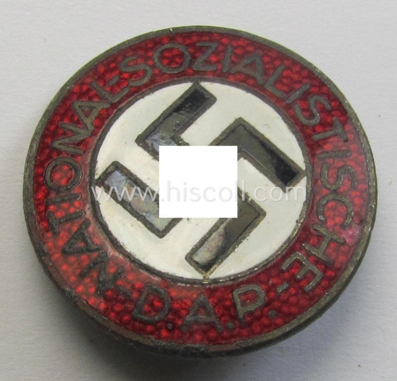 Neat - bright-red-coloured and nicely preserved! - 'N.S.D.A.P.'-membership-pin- ie. party-badge (or: 'Parteiabzeichen') which is maker-marked on its back with the makers'-designation: 'RzM' and/or: 'M1/6'