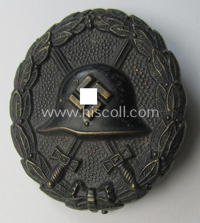 Very attractive, early-pattern black-class wound-badge (ie.: 'Verwundeten Abzeichen in Schwarz') being a detailed so-called: 'Spanish Civil-War'-version that comes in a just  moderately used- and/or worn, condition