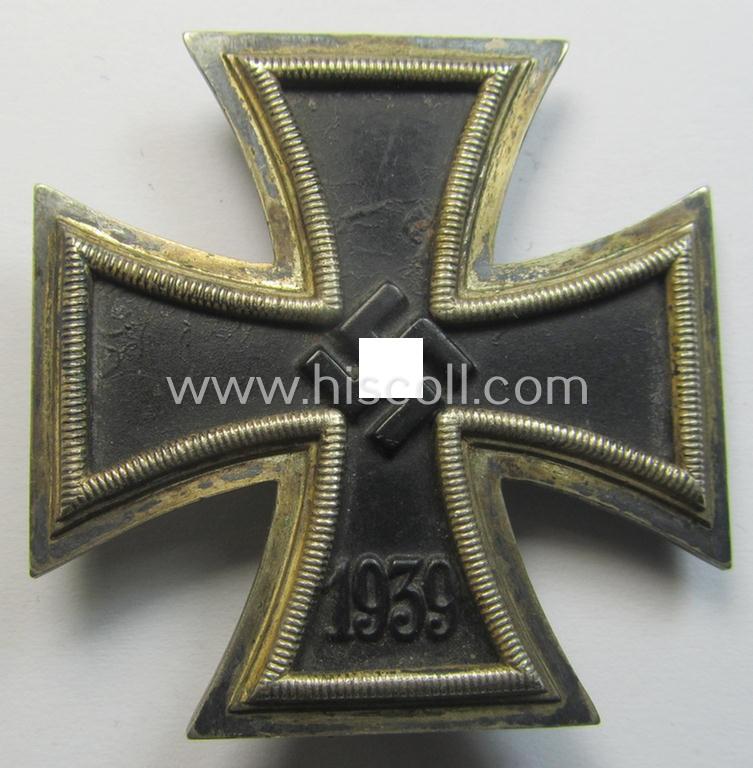Neat - and clearly used & worn! - 'Eisernes Kreuz 1. Klasse' (or: Iron Cross 1st class) being (I deem) a later-war-period- and/or neatly maker- (ie. '26'-) marked example by the maker: 'B.H. Mayers' Kunstprägeanstalt' and that comes as issued