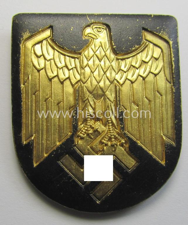 WH (KM) tropical- (ie. 'DAK'- or: 'Deutsches Afrikakorps'-) related- and/or aluminium-based, eagle-'pith-helmet'-shield being a maker- (ie. 'G.B.-41'-) marked example that comes in a 'virtually mint- ie. unissued', condition