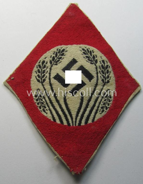 Attractive - and with certainty scarcely encountered! - early-pattern armbadge (ie. 'Ärmelabzeichen' or: 'Ärmelraute') as was specifically intended for a female member serving within the: 'Deutscher Frauenarbeitsdienst' (or: women's labour-service)