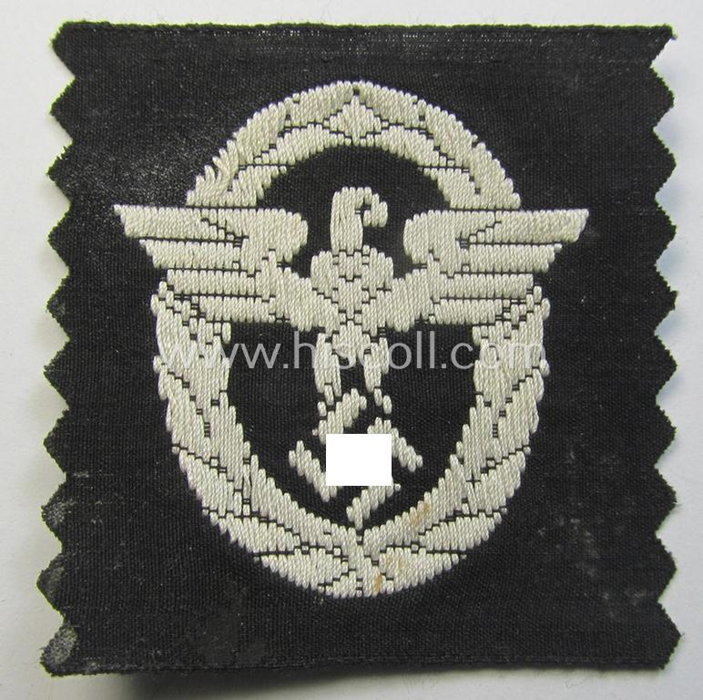 Attractive, EM/NCO-pattern, police- (ie. 'Polizei-') related cap-eagle (ie. 'Adler für Schiffchen o. Einheitsfeldmütze') being a 'virtually mint- ie. unissued' example as executed in 'BeVo'-weave-style onto a black-coloured background