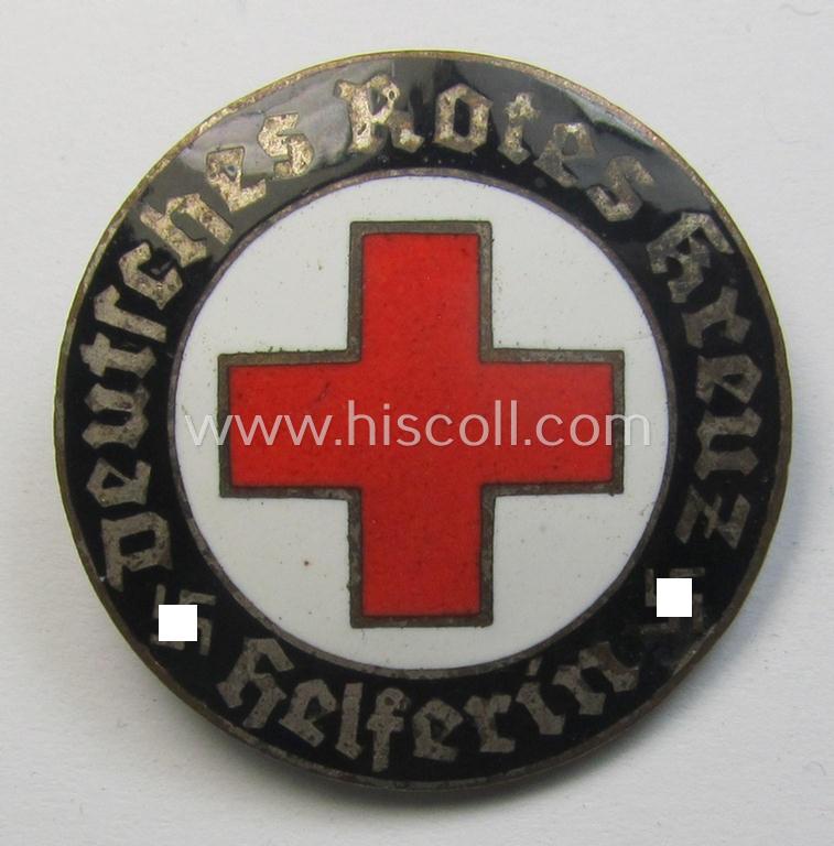 Attractive example of a DRK (ie. 'Deutsches Rotes Kreuz' or German Red Cross) nurses'-badge as was intended for a: 'Helferin' being a maker- (ie. 'HA'-) marked example that comes in a fully untouched condition