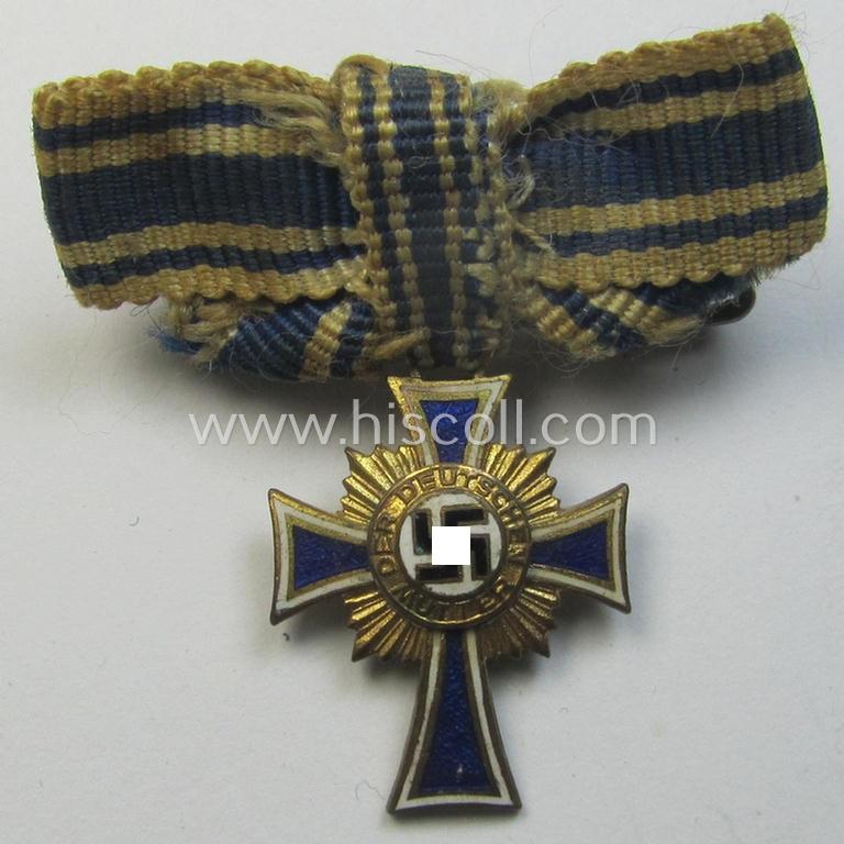 Miniature of an: 'Ehrenkreuz der deutschen Mutter - erste Stufe' (or: golden-class mothers'-cross) being a neatly maker- (ie. 'L/60'-) marked example that comes in an overall nice- (albeit moderately worn- ie. used-), condition