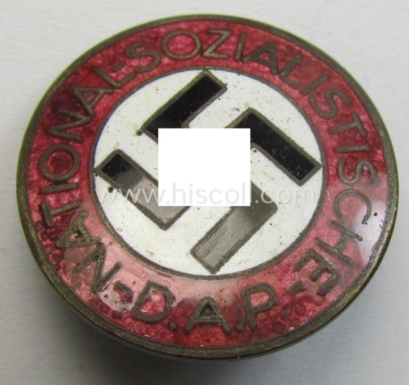 Neat - bright-red-coloured and nicely preserved! - 'N.S.D.A.P.'-membership-pin- ie. party-badge (or: 'Parteiabzeichen') which is maker-marked on its back with the makers'-designation: 'RzM' and/or: 'M1/63'