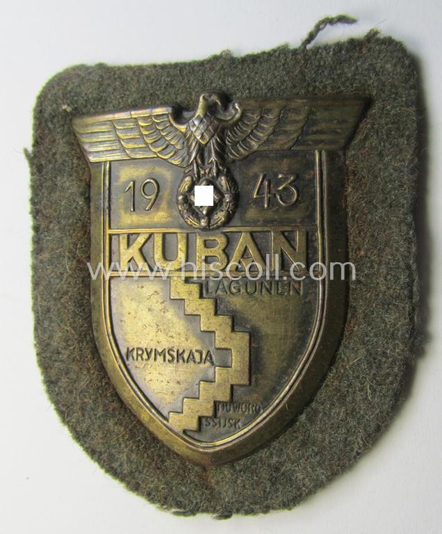 Very attractive - and actually scarcely encountered! - WH (Heeres ie. Waffen-SS) 'Kuban'-campaign-shield that comes mounted onto its original field-grey-coloured- and/or woolen-based 'backing' as issued and/or used