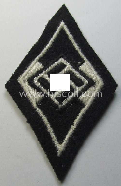 Attractive, Waffen-SS-pattern and machine-embroidered and/or black- and white-coloured sleeve-insignia (ie. 'Ärmelraute') depicting a so-called: 'HJ-Raute' as was used and intended to signify former membership within the 'Hitlerjugend'