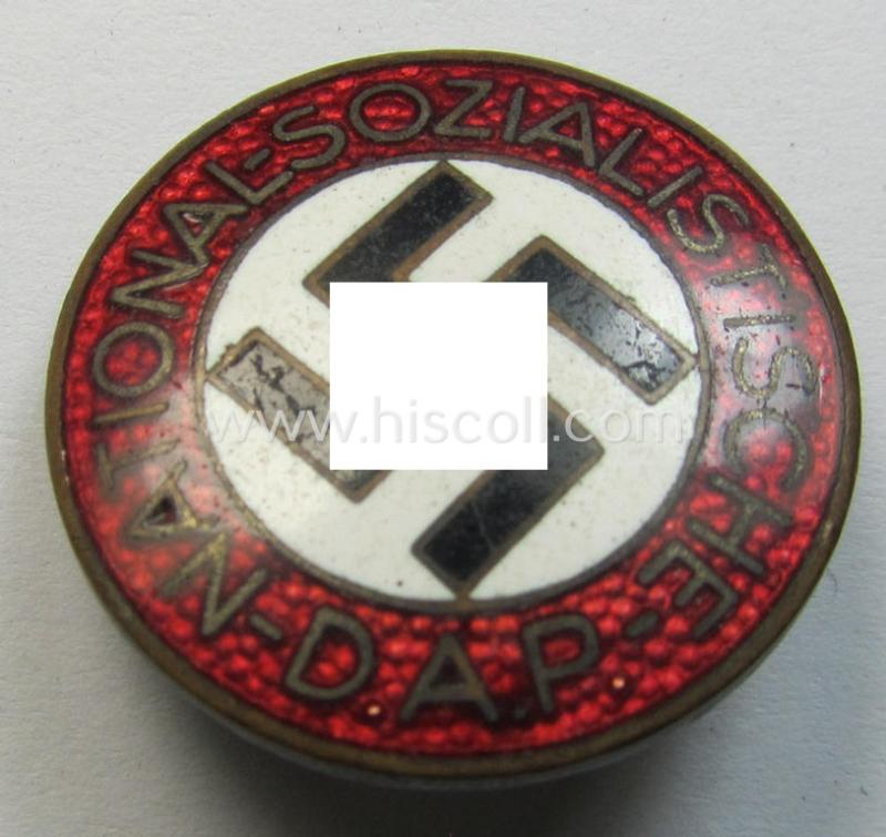 Neat - bright-red-coloured and nicely preserved! - 'N.S.D.A.P.'-membership-pin- ie. party-badge (or: 'Parteiabzeichen') which is maker-marked on its back with the makers'-designation: 'RzM' and/or: 'M1/101'