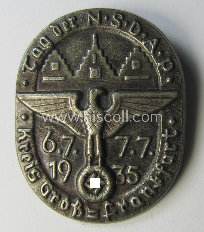 Commemorative, silver-coloured N.S.D.A.P.-related 'tinnie' being a non-maker marked example depicting a detailed eagle-device and towns'-view surrounded by the text: 'Tag der N.S.D.A.P. - Kreis Gross-Frankfurt - 6.7./7.7.1935'