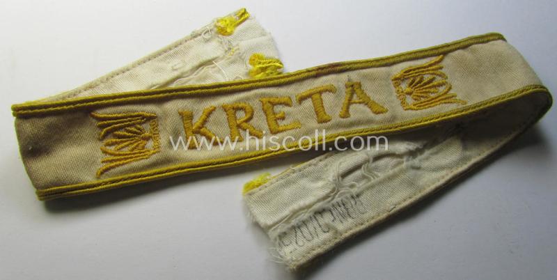 Superb, WH cuff-title (ie. 'Ärmelstreifen') entitled: 'Kreta' (being an example that bears a printed 'RbN.'-numeral and that comes in an issued-, clearly worn- and/or most certainly once tunic-attached, condition)