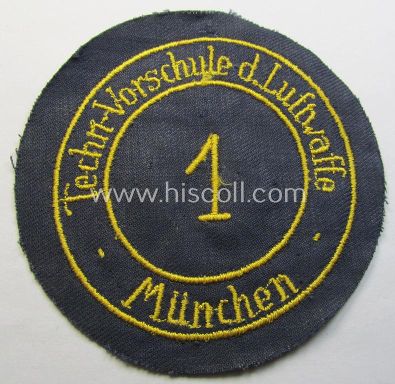 Attractive - and truly scarcely encountered! - HJ- (ie. 'Flieger-HJ') specialist-armbadge (or: 'Schulabzeichen') depicting the text: '1. Techn. Vorschule d. Luftwaffe - München'