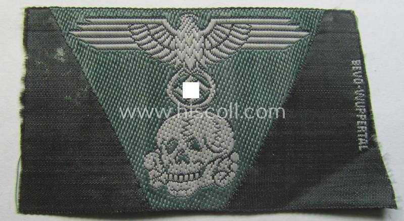 Superb, Waffen-SS field-grey-coloured, M43-pattern cap-trapezoid as was intended for usage on the M43-model field-caps (ie. 'Einheitsfeldmützen') being a 'BeVo-Wuppertal'-marked example that comes in a 'virtually mint- ie. unissued', condition