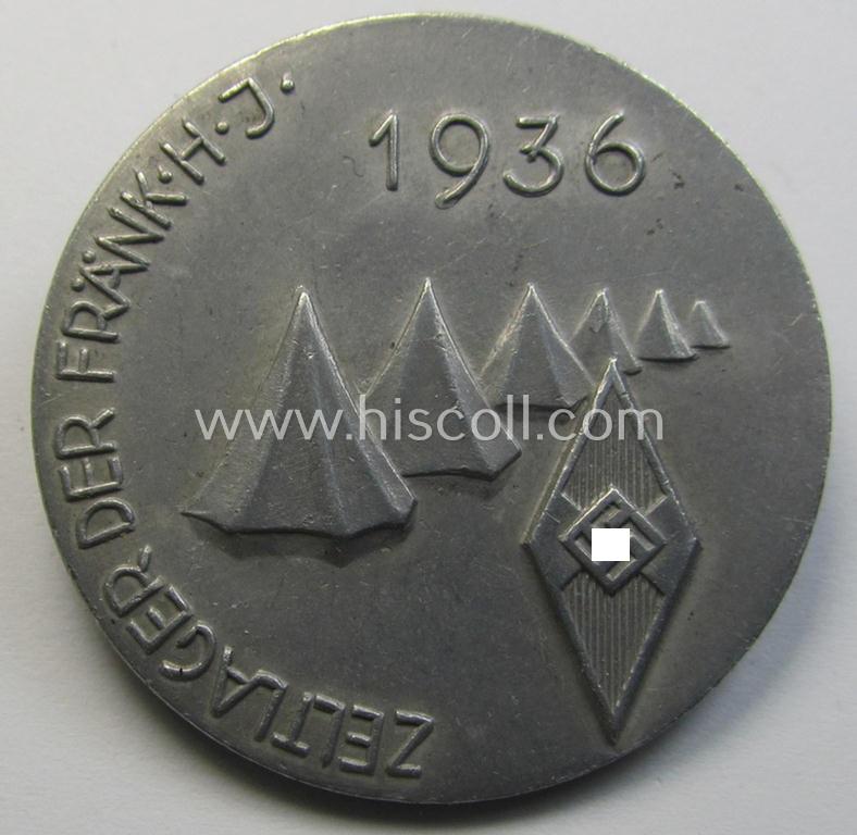 Commemorative - aluminium-based- and/or: greyish-silver-coloured-, 'HJ'-related 'tinnie', being a non-maker-marked example, depicting a 'HJ-Raute' surrounded by the text: 'Zeltlager der Frank. H.J. - 1936'