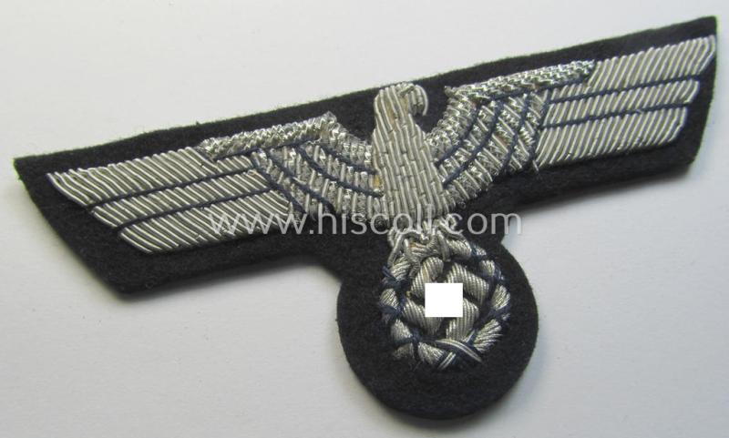 Very attractive - and truly scarcely seen! - WH (Kriegsmarine) neatly hand-embroidered, officers'-type breasteagle on a darker-blue background as was specifically intended for the various naval administrative-officials (ie. 'Beambten der Kriegsmarine')