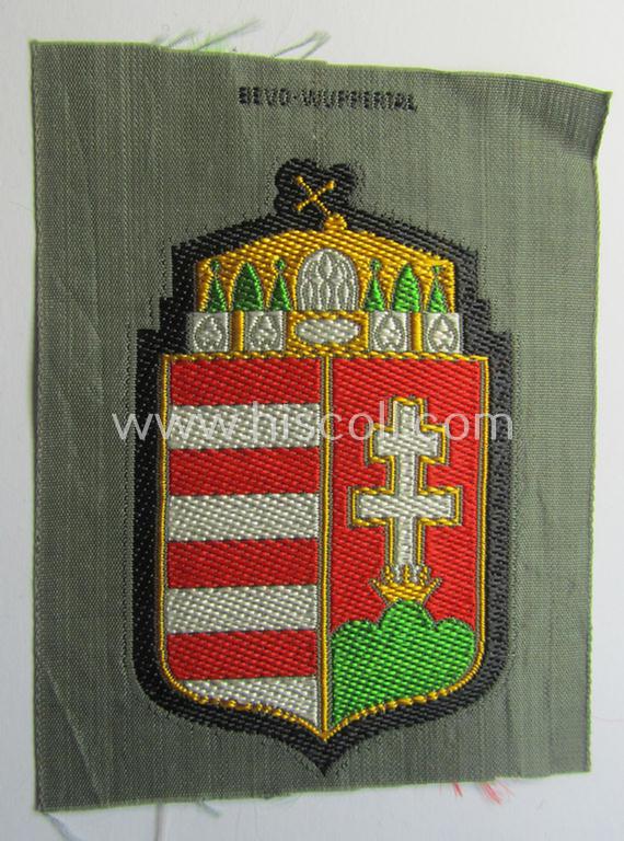 Attractive - and scarcely encountered! - German-produced, 'BeVo'-type armshield showing the coat of arms of Hungary (being a piece that was intended for a volunteer who served within the: 'Deutsche Wehrmacht')