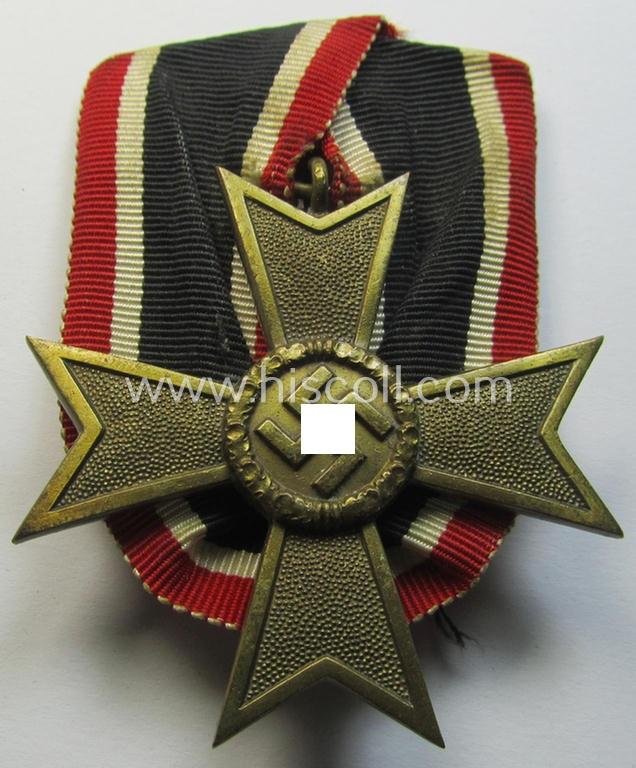 Attractive - and truly unusually seen! - golden-bronze-toned so-called: 'Einzelspange' showing a: 'Kriegsverdienstkreuz II. Klasse ohne Schw.' (or: war-merits' cross 2nd class with swords) being a very detailed- and/or 'Buntmetall'-based specimen