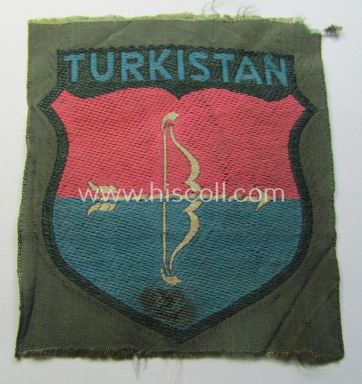 Attractive, 'BeVo'-type armshield entitled: 'Turkistan' (being of the scarcely encountered third and final pattern!) that was intended for a volunteer who served within the: 'Deutsche Wehrmacht' ie. within the: 'Turkistanisches Legion'