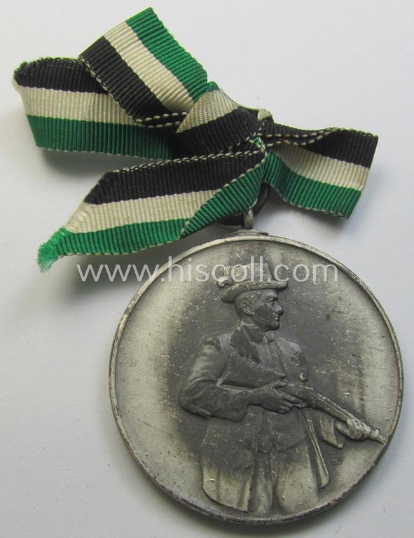 Superb - and most certainly unusually seen! - frosted-silver-toned, TR-period shooting-medal showing on its front a uniformed hunter and that is entitled: 'Vereinsmeister 1939' and that comes mounted onto its 'bow-tie-shaped' ribbon as issued