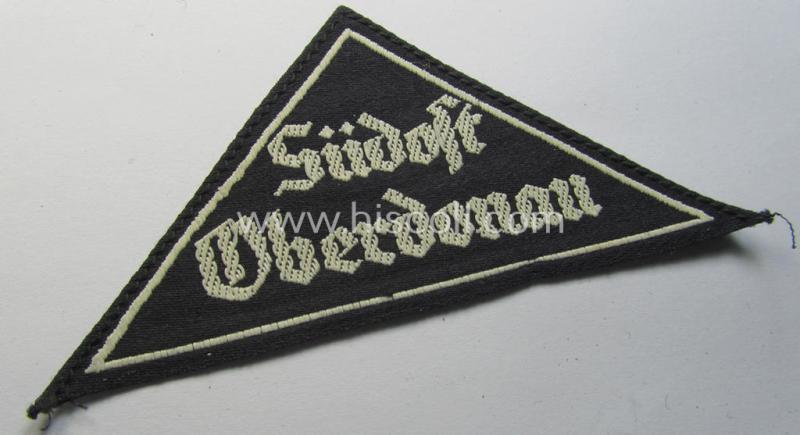 Neat, 'HJ' ('Hitlerjugend') ie. 'BDM' ('Bund Deutscher Mädel') district-triangle (ie. 'Gebietsdreieck') entitled: 'Südost Oberdonau' (being a 'virtually mint' example that retains its period-attached, paper-based so-called: 'RzM'-etiket)