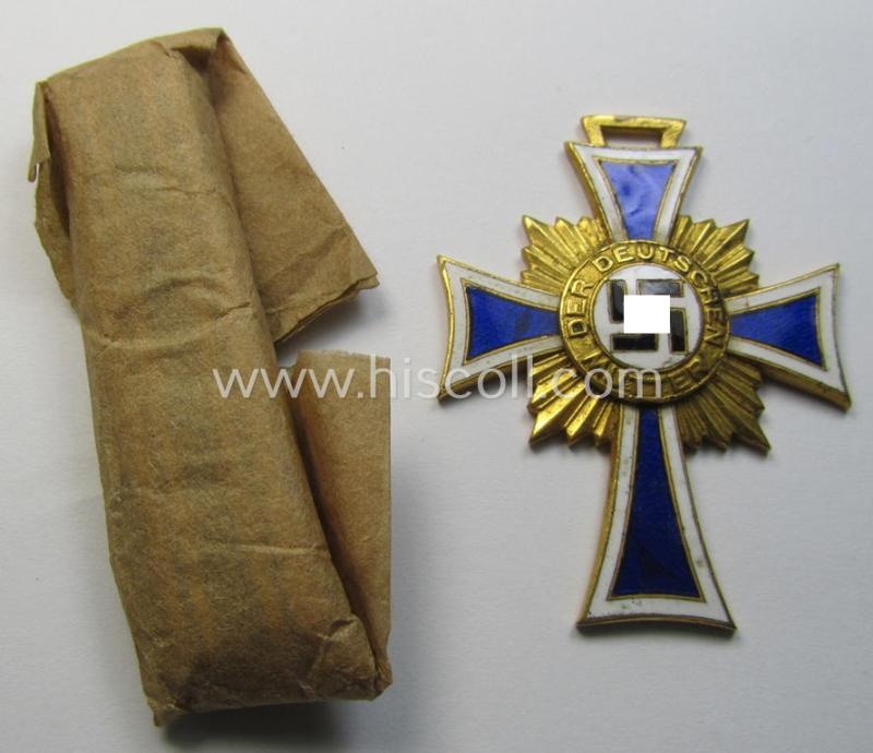 Attractive, 'Ehrenkreuz der deutschen Mutter - erste Stufe' (or: golden-class mothers'-cross) being a 'virtually mint' example that comes with its accompanying, long-sized- (and also 'mint'!) ribbon as issued and/or recently found