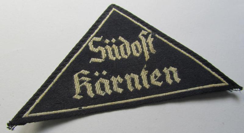 Attractive - albeit clearly used- and/or worn! - 'HJ' ('Hitlerjugend') ie. 'BDM' ('Bund Deutscher Mädel') district-triangle (ie. 'Gebietsdreieck') entitled: 'Südost Kärnten'