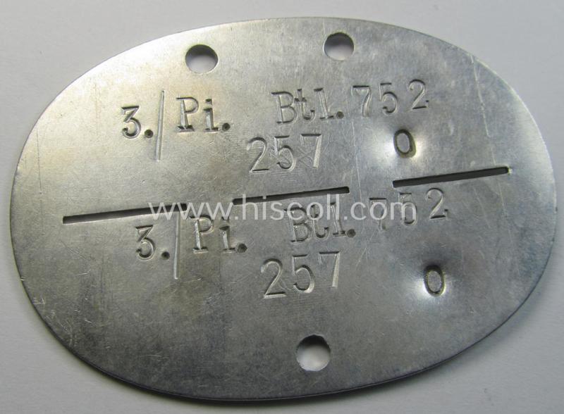 Aluminium-based, WH (Heeres) ie. 'Pioniere- o. Bau-Truppen'-related ID-disc bearing the clearly stamped unit-designation: '3./Pi.Btl. 752' and that comes as issued and/or worn