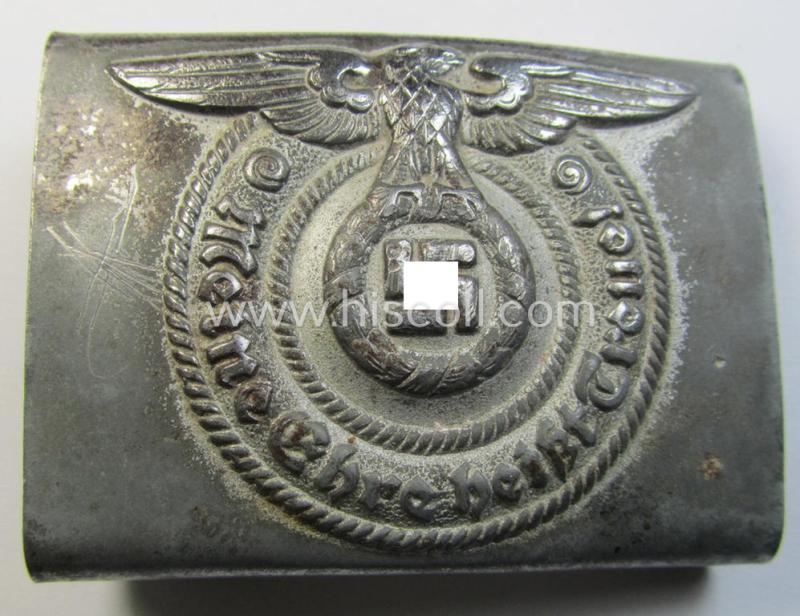 Attractive, Waffen-SS enlisted-mens'- (ie. NCO-) type belt-buckle (being a typical, unmarked and typical steel-based: 'Overhoff & Cie'-example) that comes in a surely issued- and/or moderately used- ie. worn, condition