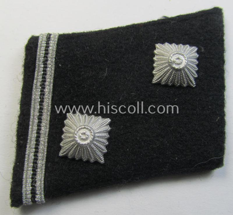 Attractive - and clearly used and or tunic-removed! - Waffen-SS NCO-pattern rank-collar-rank-tab ('Kragenspiegel') being a 'standard-issue'-pattern example as executed in black-coloured wool as was intended for usage by an: 'SS-Hauptscharführer'