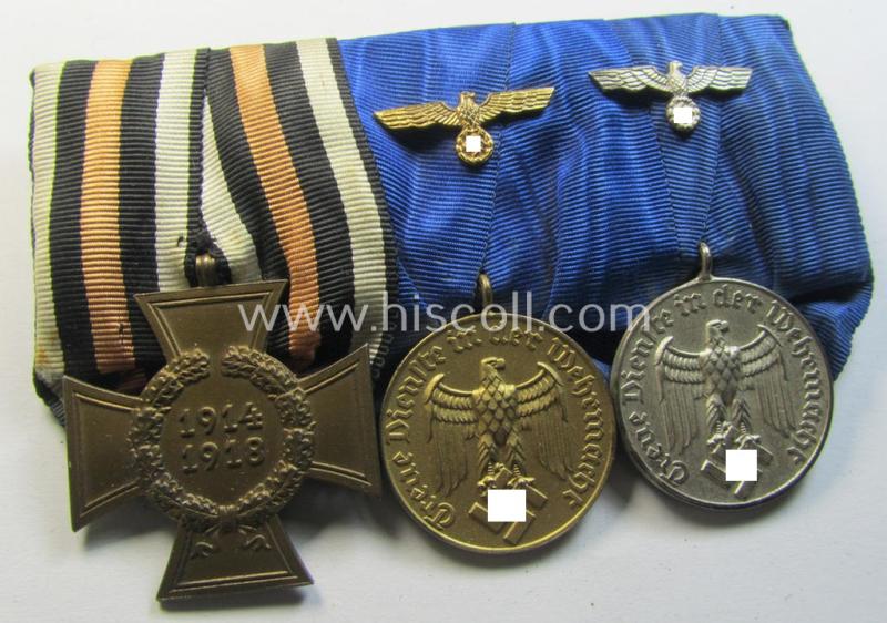 Attractive, 3-pieced medal-bar (ie. 'Ordenspange') showing resp. a WWI-period: 'FKK 1914-18 ohne Schw.' and two WWII-period: WH (Heeres or KM) so-called: 'Dienstauszeichnungen für 4 u. 12 Jahre Treue Dienste'