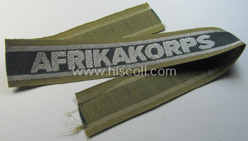 Superb, 'BeVo'-like cuff-title (ie. 'Ärmelstreifen') entitled: 'Afrikakorps' being a presumably issued but simply never worn example that comes in an overall very nice- (ie. non-shortened- and never tunic-attached-), condition