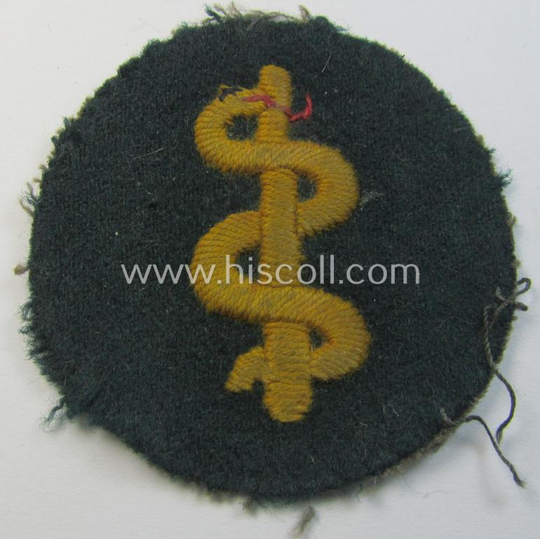 Neatly hand-embroidered - and truly used! - WH (Heeres) trade- and/or special-career insignia (ie.: 'Heeres-Tätigkeitsabzeichen') as was specifically intended for usage by: 'Sanitätspersonal' (or: medical orderlies- ie. staff)