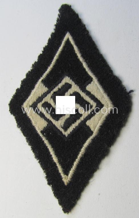 Attractive, Waffen-SS-pattern and machine-embroidered and/or black- and white-coloured sleeve-insignia (ie. 'Ärmelraute') depicting a so-called: 'HJ-Raute' as was used and intended to signify former membership within the 'Hitlerjugend'