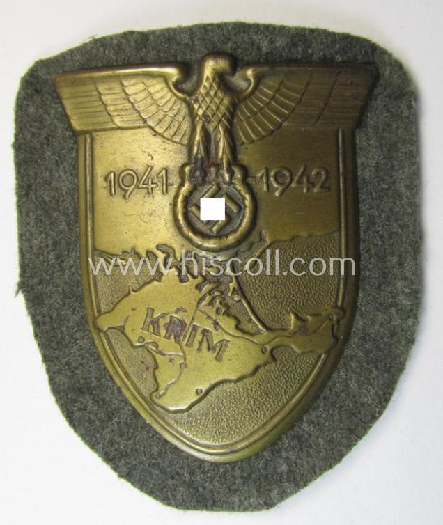 Attractive, WH (Heeres ie. Waffen-SS) 'Krim'-campaign-shield (as was produced by a by me unidentified maker) and that comes in a probably issued - albeit  still 'virtually mint', condition