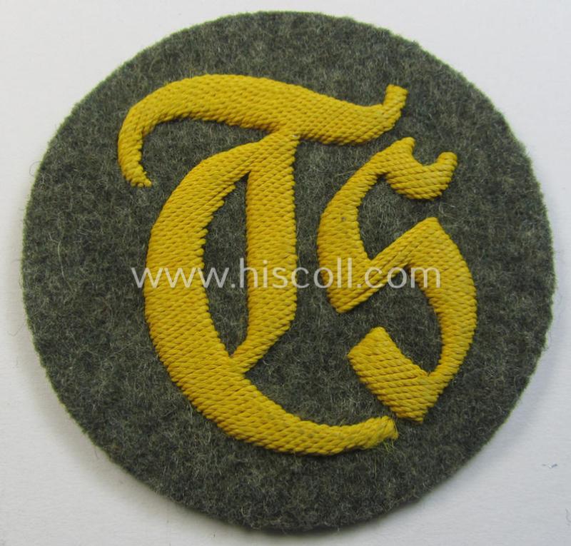 Superb - and truly rarely encountered! - WH (Heeres) hand-embroidered, trade- and/or special-career insignia (ie. 'Tätigkeitsabzeichen') as executed on a darker-green-coloured background as was specifically intended for a: 'Truppensattlermeister'