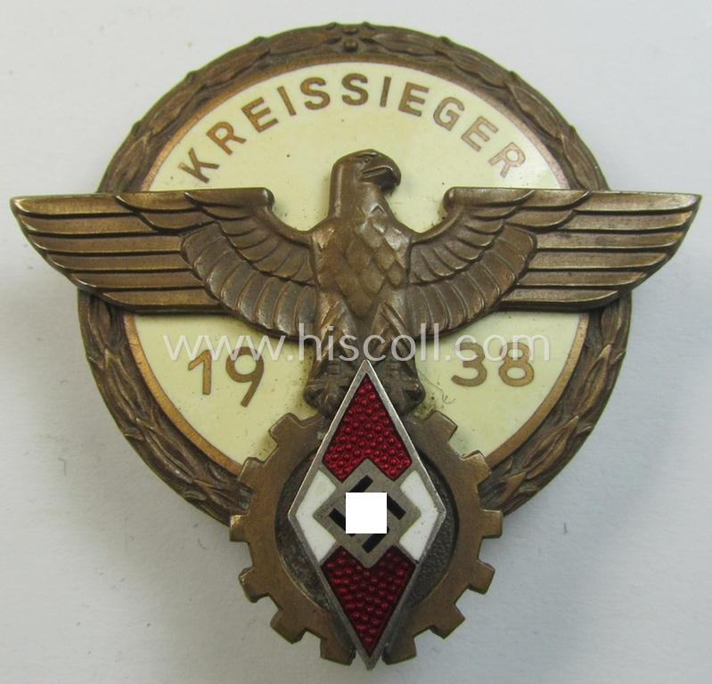 Superb, 'HJ'- ('Hitlerjugend') ie. 'BDM'- ('Bund Deutscher Mädel') related: 'Reichsberufswettkampf-Siegerabzeichen' (of the 2nd model) entitled: 'Kreissieger 1938' and being a neatly maker- (ie.: 'G. Brehmer'-) marked example