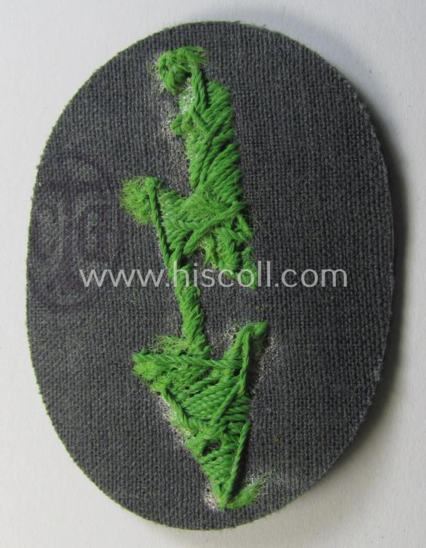 WH (Heeres) trade- and/or special-career-insignia ie. hand-embroidered 'signal-blitz' being a nicely maker- (ie. 'CTG'-) marked example as executed in bright-green linnen as was specifically intended for a soldier within the: 'Pz.-Gren.-Truppen'