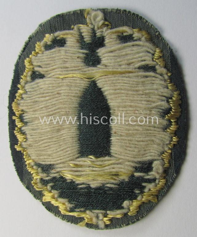 Neat - moderately used- and/or worn! - example of a WH (Heeres) 'Richtabzeichen für Artillerie-Richtkannoniere' (or: artillery gun-layers patch) as executed in neat 'BeVo-weave'-pattern (and that comes in a carefully tunic-removed condition)