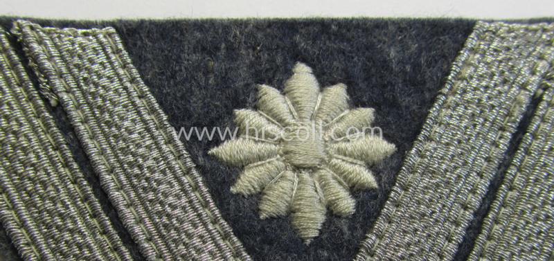 Attractive, WH (Luftwaffe) 'Armwinkel' (or: arm-chevron) as executed on typical bluish-grey-coloured wool as was specifically intended for usage by a soldier with the (unusually encountered!) rank of: 'Stabsgefreiter'