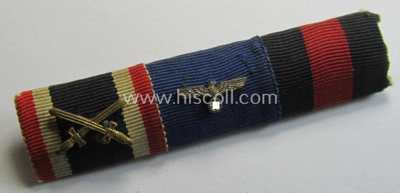 Three-pieced, WH (Heeres etc.) ribbon-bar (ie. 'Feld- o. Bandspange') showing respectively the ribbons for a: 'KvK II. Klasse m. Schwertern', a: WH (KM o. Heeres) 'Dienstauszeichnung für 4 Jahre treue D.' and a: Czech 'Anschluss'-medal