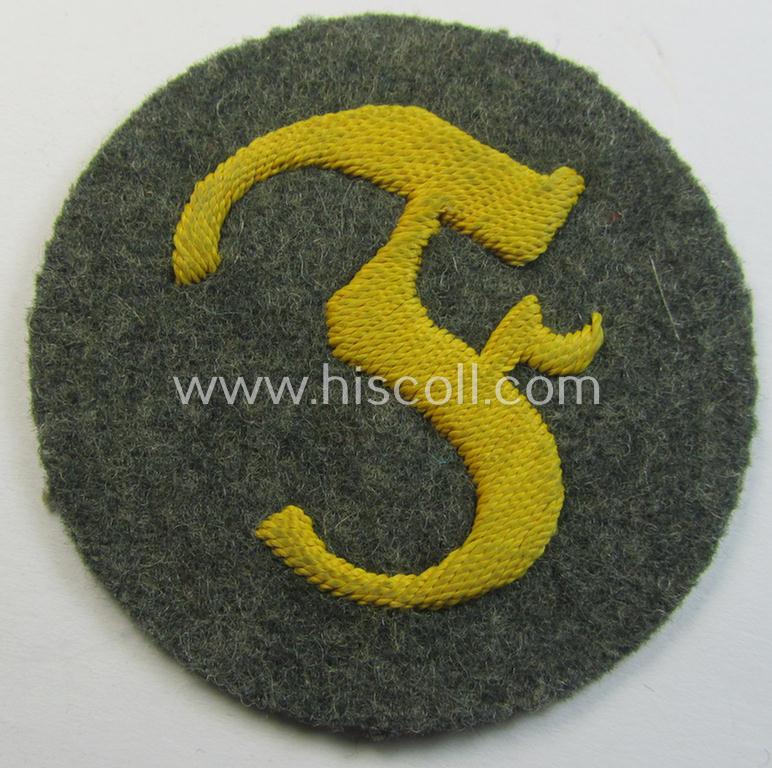 WH (Heeres) so-called: trade- and/or special-career arm-insignia (ie. 'Laufbahn- o. Tätigkeitsabzeichen') as was specifically intended for an army: 'Feuerwerker' (being a neatly hand-embroidered variant on field-grey-coloured wool)