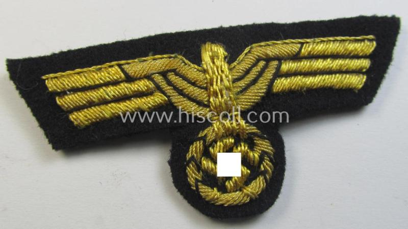 Attractive, WH (KM) officers'-type, hand-embroidered visor-cap-eagle (ie. 'Schirmmützenadler für Offiziere der KM') as was executed in bright-golden-coloured braid as was intended for usage on the various naval, officers'-pattern visor-caps